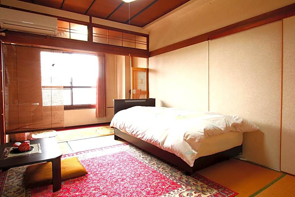 Photo 1 of 2 of Single Room with Shared Bathroom