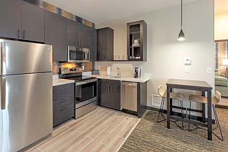One-Bedroom King Suite with Sofa Bed and Roll-In Shower - Hearing Accessible
