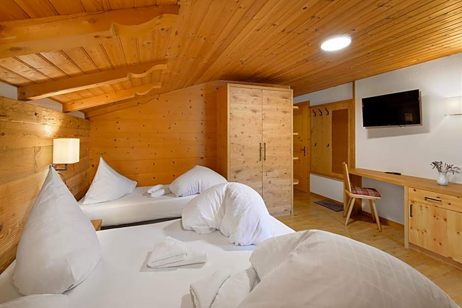 Photo 1 of 27 of Triple Room
