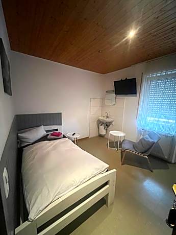 Single Room with Shared Shower and Toilet