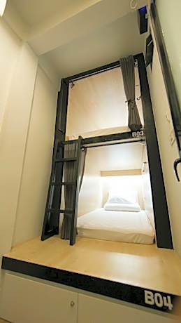 Bed in 4-Bed Female Dormitory Room with Shared Bathroom