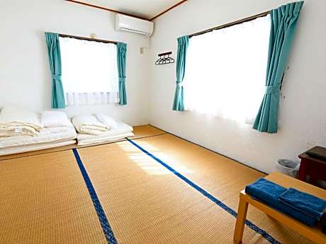 Quadruple Room with Shared Bathroom