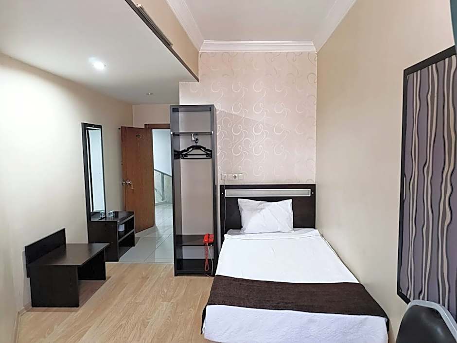 Foto 1 daripada 4 — Single Room