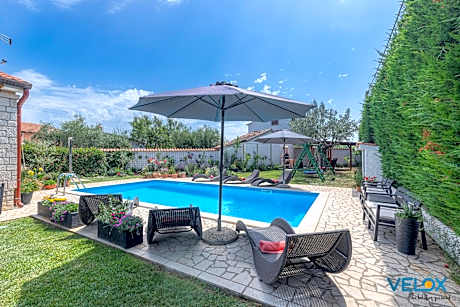 Holiday House with Pool & Grill