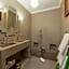 Riad Le J