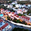 Theos Village Apartments