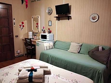 Double or Twin Room with Extra Bed and Shared Bathroom