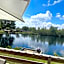 Award winning Serenity Lodge with outstanding lakeside views from the hot tub , at Tallington Lakes Leisure Park, Stamford