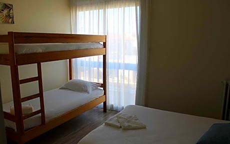 Quadruple Room (2 Adults + 2 Children)