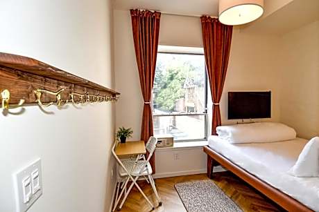 Two-Level Queen Room Top Floor (Ladder Required)