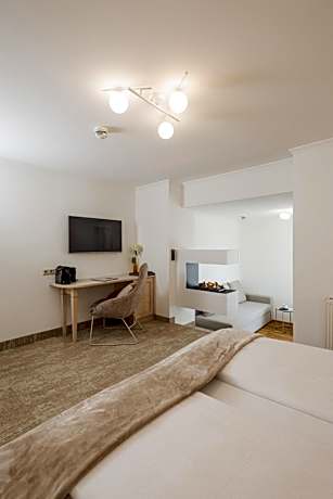 Family Room with Balcony and Electric Fireplace