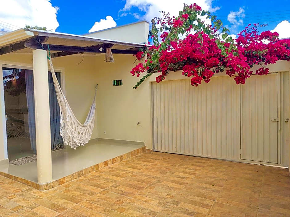 Chalé com ar condicionado e garagem