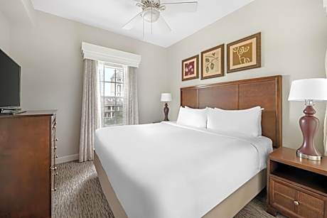 Two-Bedroom Deluxe Suite with One King Bed, Two Double Beds and Golf View