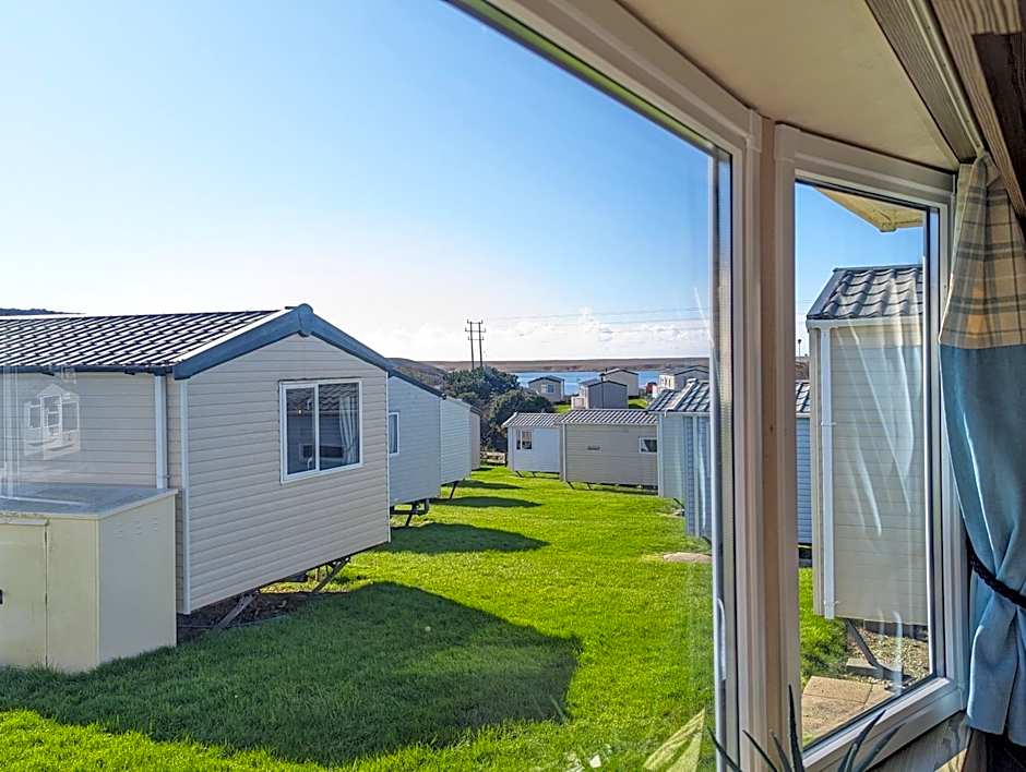 Caravan sleeps 8 at Littlesea, Weymouth