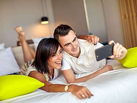 Superior Room with One Double Bed and One Sofa Bed - Dune and Parking Side