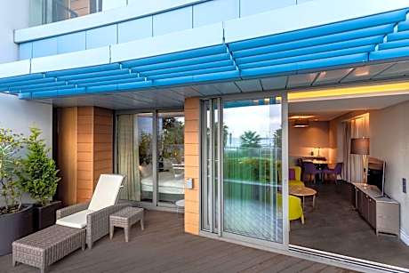 Junior Suite with Balcony and Garden View