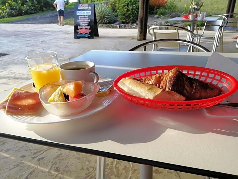 Studio Bô Soley Saint-François Piscine & Plage les pieds dans l'eau