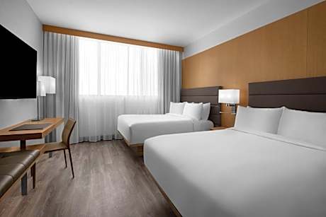 Queen Room with Two Queen Beds with Roll-In Shower and City View - Mobility Accessible