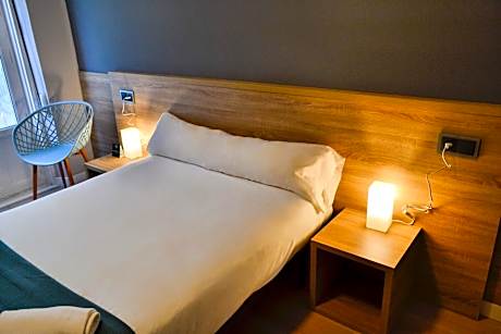 Quadruple Room with Private Bathroom