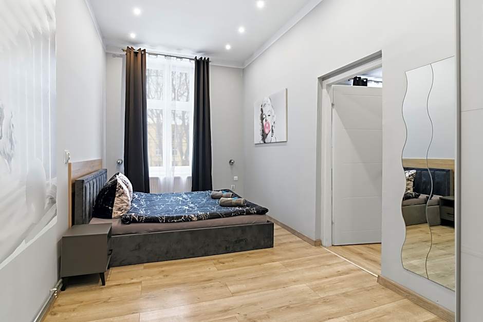 Queen Apartments