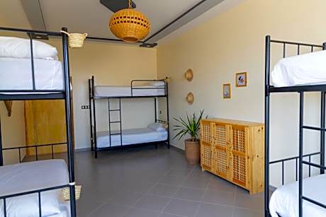 Single Bed in Dormitory Room