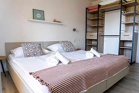 One-Bedroom Apartment with Balcony and Lake View