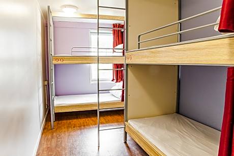 Bed in 4-Bed Female Dormitory Room with Shared Bathroom