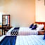 Capital O Hotel Aurora