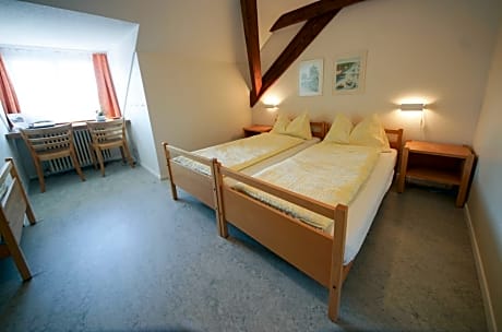 Single Bed in Male Dormitory Room