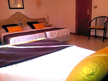 Quadruple Room (3 Adults + 1 Child)