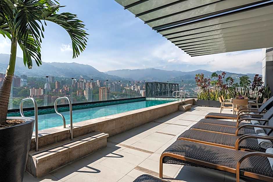 York Medellin, Curio Collection by Hilton