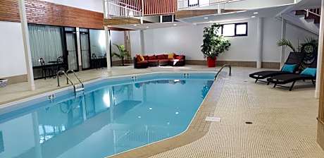 Queen Suite with Two Queen Beds and Pool View - Non-Smoking