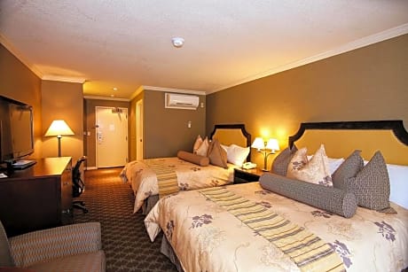 2 Queen Beds - Non-Smoking, Deluxe Room, Pet Friendly Room, Table And Chairs, Mini Fridge, Keurig Coffee Maker, Continental Breakfast