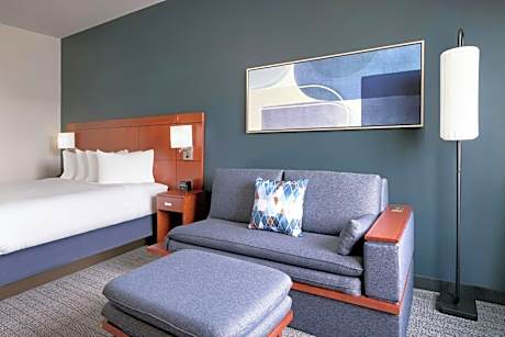 King Room with Sofa Bed and Roll-in Shower - Mobility and Hearing Accessible