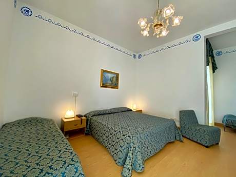 Quadruple Room with Side Sea View