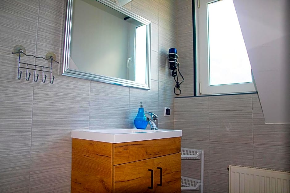 Sztil - Apartamenty i drewniane domki