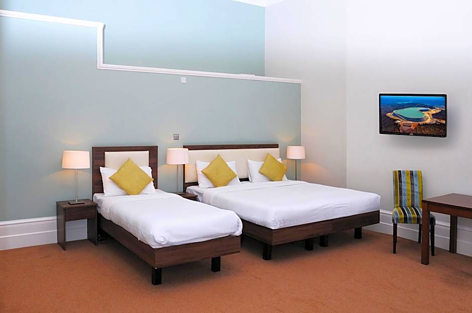 Photo 1 of 7 of Quadruple Room