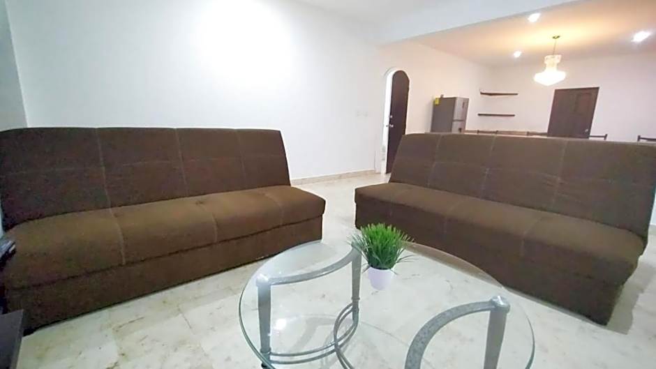 "Spacious Suite with 4 Bedrooms and Amenities"