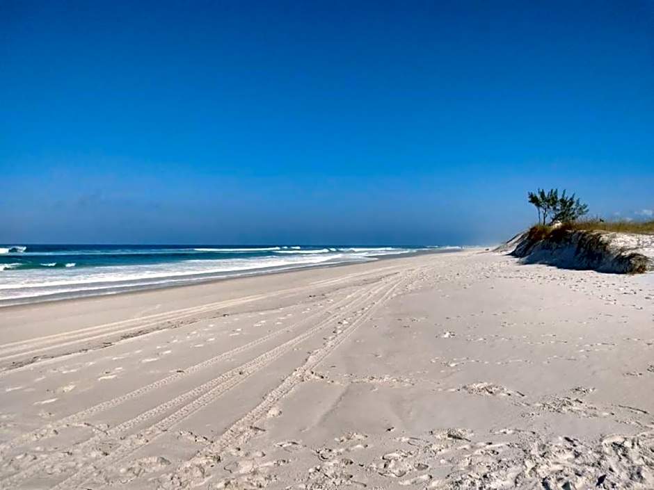 Apartamento no Golden Lake - pé na areia, agua de côco e cervejinha