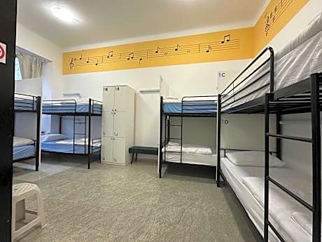 Single Bed in Dormitory Room