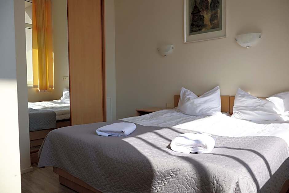 Palangos Dailė Self Check-in