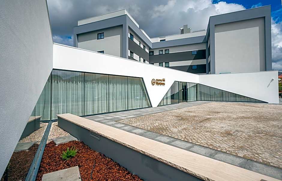 Essence Inn Marianos Hotel