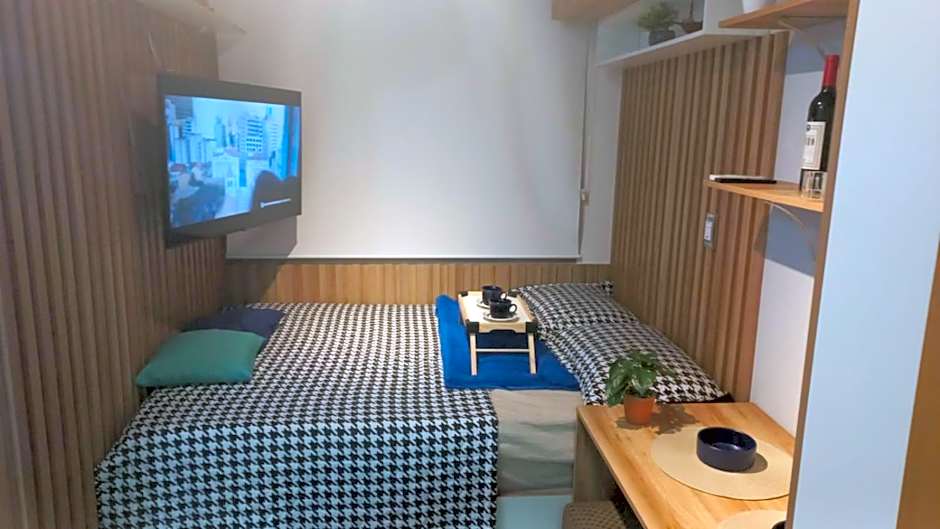 Studio aconchegante em frente a praia