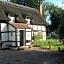 THE MOATS - CODDINGTON A small private thatched cottage B&B located in quiet countryside between Ledbury and Malvern - convenient for the Malvern Three Counties Showground and 5 miles from excellent shops restaurants and Ledbury Poetry Festival