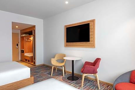 Queen Room with Two Queen Beds and Airport View