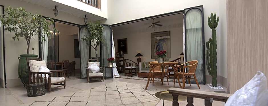 Riad Le J