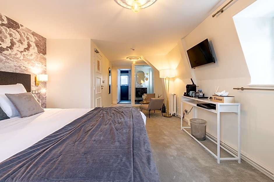 Hôtel Échappée en Baie - Parking privé gratuit dont forfaits bornes électriques réservable