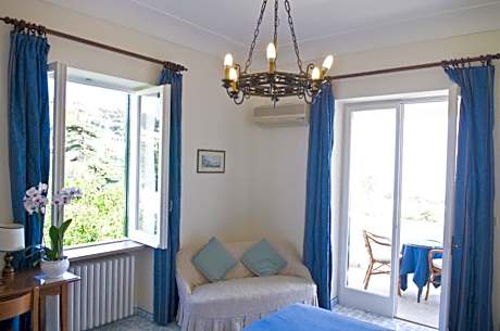Superior Triple Room with Balcony and Garden View