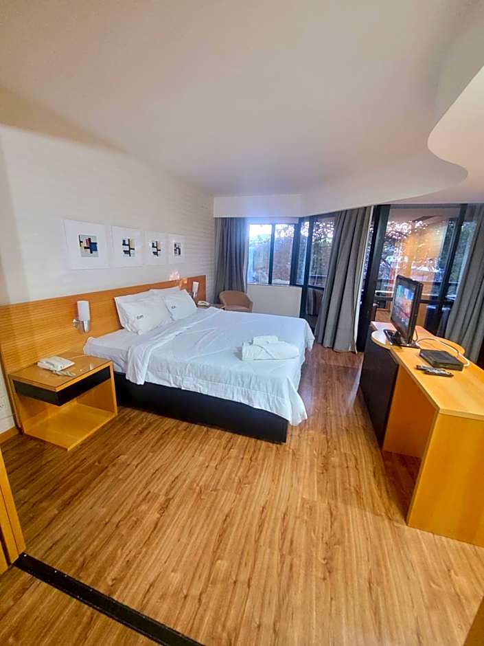 Flat no Golden Tulip By Rei dos Flats