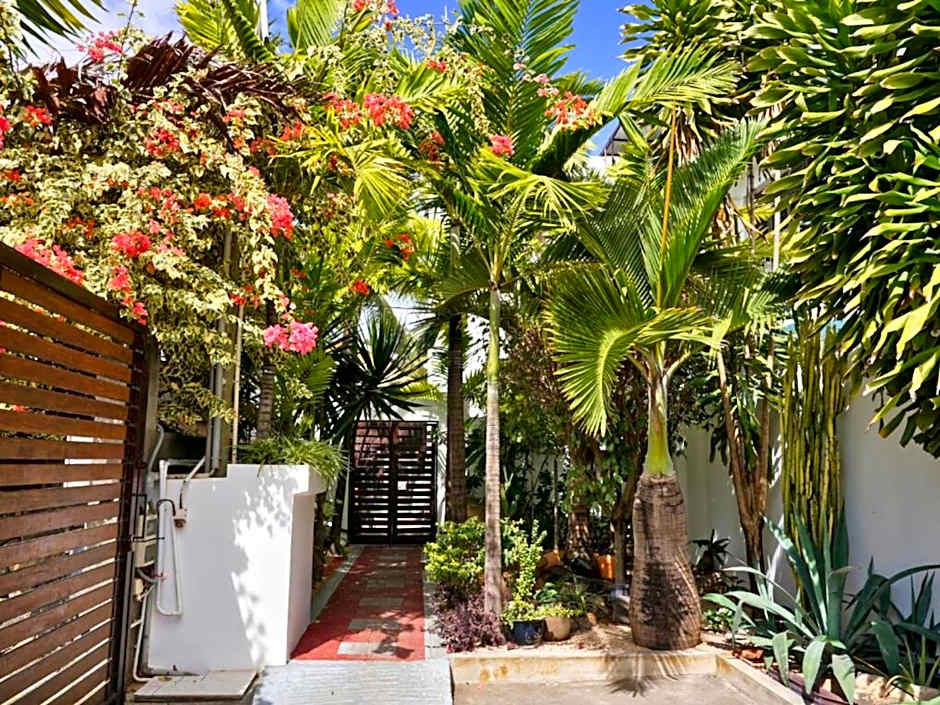 Villa Alizée - Boutique Hôtel Expérience - Idéal Couples & Pros - Piscine - Restaurant - Rooftop bar - Parking privé - 10min Port-Louis - Ambiance Tropical chic & authentique